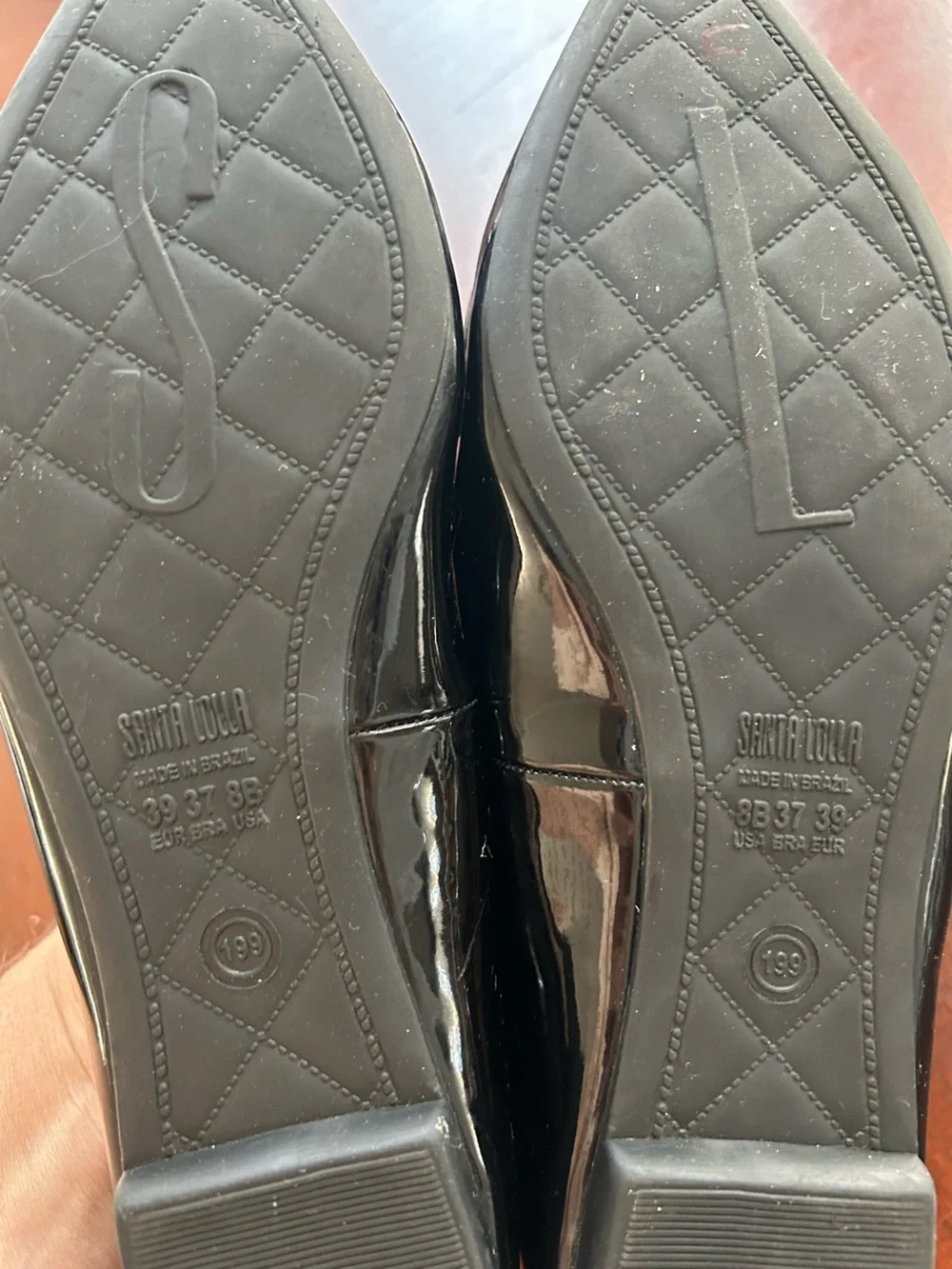 Pointed Toe Black Patent Loafer Flats size 8B It shows wear on the inside.